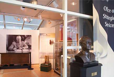 A bust of Maj. Gen. William J. Donovan alongside related artifacts.